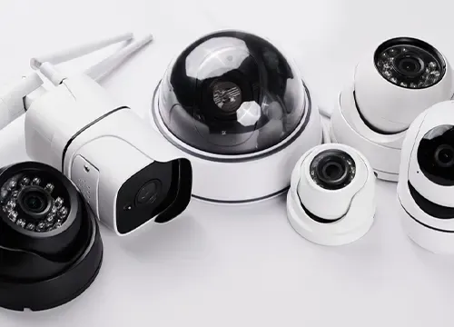 Installer testing a mounted CCTV camera on-site in Brampton.