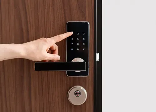 Access Control & Entry Solutions 1 Technician wiring a smart lock system with a maglock mechanism.