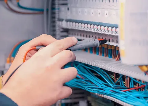 IT Networking & Connectivity 1 Close-up of structured cabling including Cat6 and coax lines.