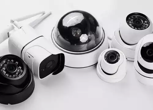 Installer testing a mounted CCTV camera on-site in Brampton.