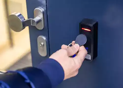 Access Control & Entry Solutions 2 Key-fob card access reader being mounted at a Brampton office building.