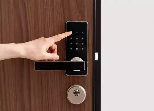 Access Control & Entry Solutions 1 Technician wiring a smart lock system with a maglock mechanism.
