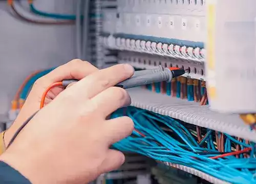 IT Networking & Connectivity 1 Close-up of structured cabling including Cat6 and coax lines.