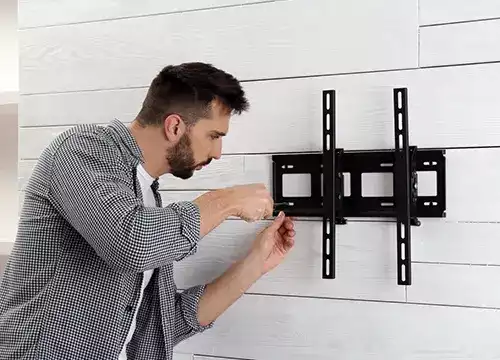 TV & Home Entertainment 1 Flat-screen TV mounted with a full-motion articulating wall mount.
